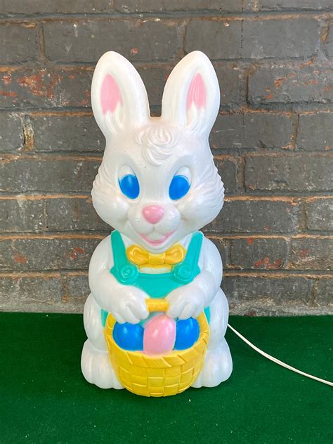 Light cord and bulb are included- and in great working condition. . Blow mold easter decorations